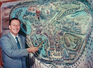 Walt Disney in front of early rendering Disneyland